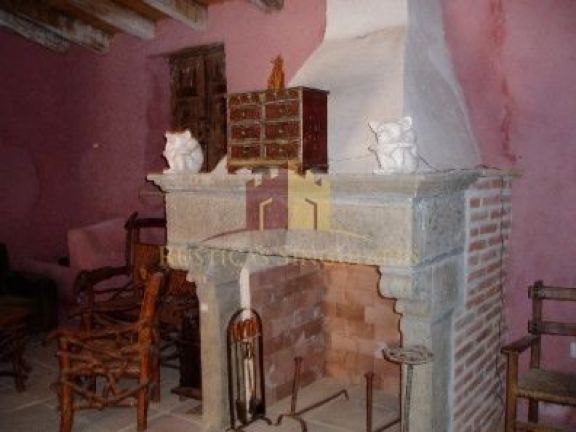 Carved stone fireplace